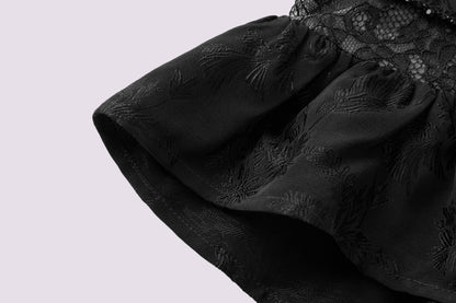 Schwarzes Jacquard-Neckholderkleid