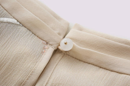 Gelbe, bestickte ärmellose Bluse
