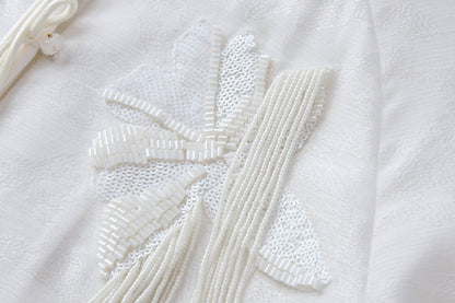 Weißer Jacquard-Mantel mit Stickereien
